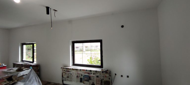 freshly painted walls and a windows