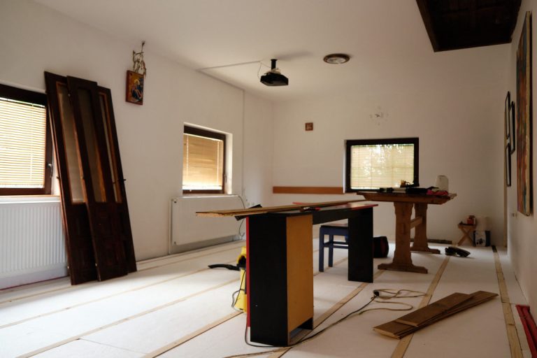 a room with styrofoam isolation layer on a floor
