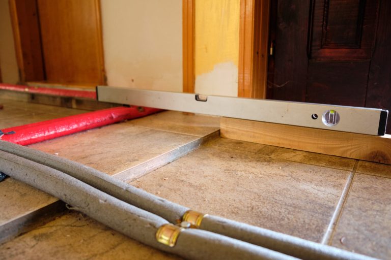 a level and a heating pipes