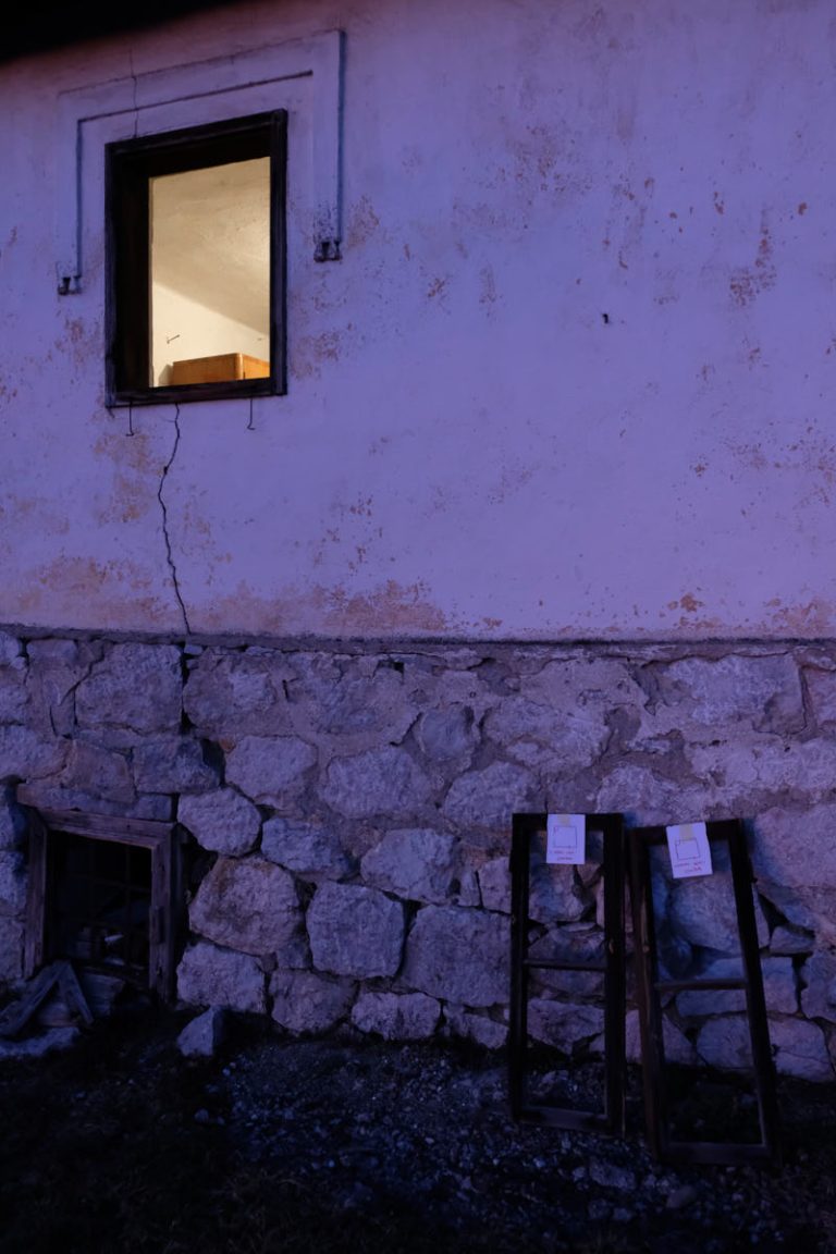 window panels and an old house