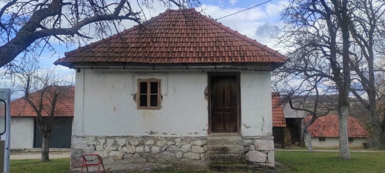 an old house with a new wooden window