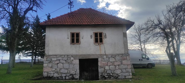 an old house with new wooden windows