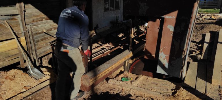 workers plaining a wood
