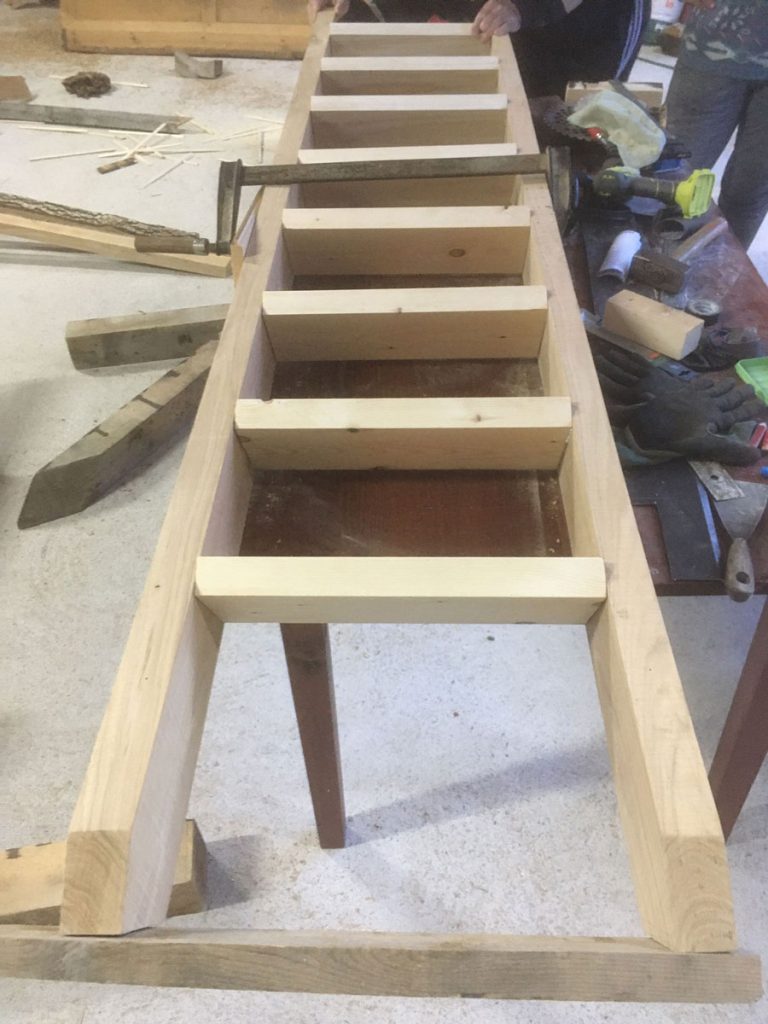 a wooden staircases in a workshop