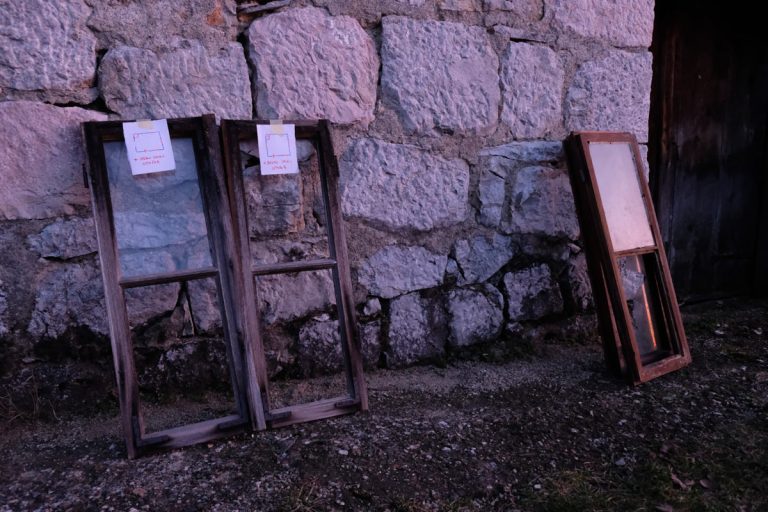 old windows and a stone foundation
