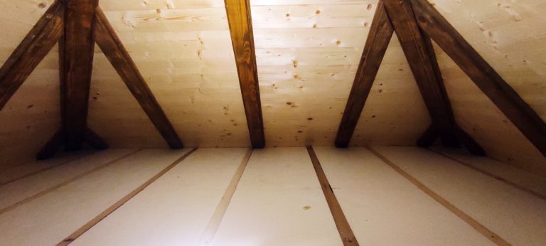 a wooden cottage interior with floor isolation