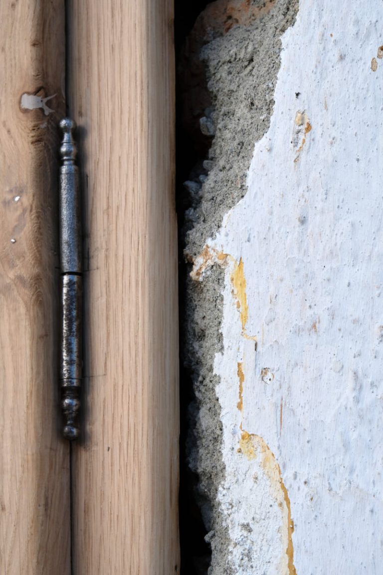 a wooden window hinge