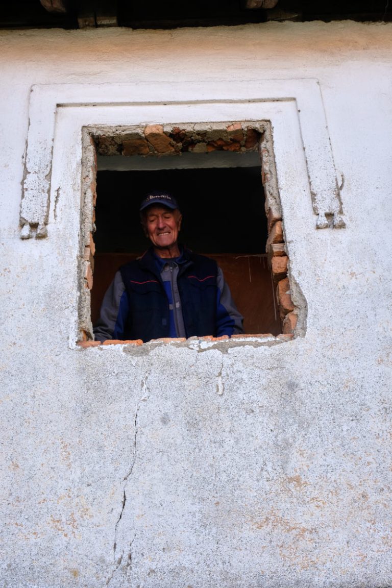 a worker in a windows hole